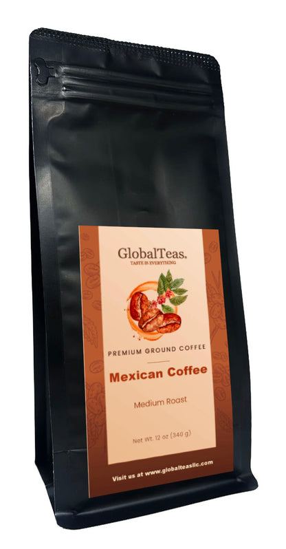 A black coffee bag labeled "Mexican Coffee, Medium Roast" by GlobalTeas, with a graphic of coffee beans and leaves, for Mexican Chocolate Coffee.