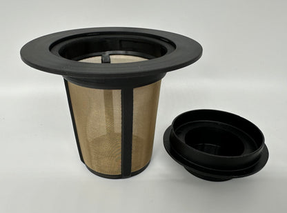 A metal mesh coffee filter with black plastic holder, ideal for brewing organic coffees.