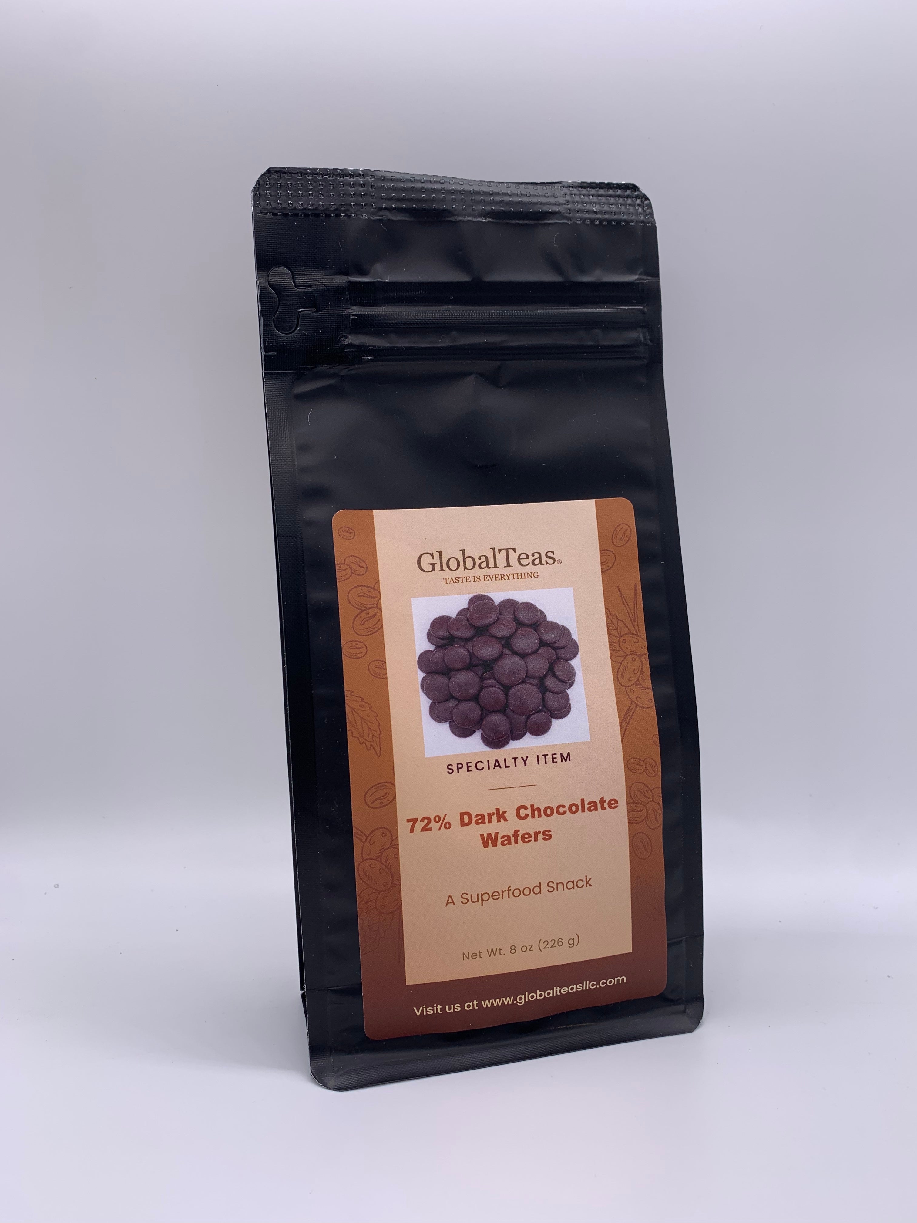 A pile of dark chocolate discs with smooth surfaces and rich color, perfect for Dark Chocolate Mocha.